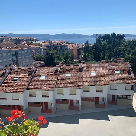 Con Piscina En El Centro De Appartement Sanxenxo
